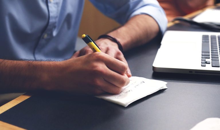 Man, write, plan — Linen services providing fresh, clean, and well-maintained supplies for businesses and events